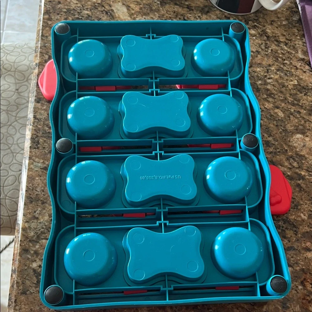 Teal and Red Dog Feeder with Storage Compartments